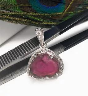 <p>Sterling Silver Natural Watermelon Tourmaline Slice Pave Diamond Pendant.</p> <p>** HANDMADE PENDANT**<br> SIZE : 26mm x 18mm x 7.25mm ( including Bail)<br> GEMSTONE : NATURAL WATERMELON TOURMALINE SLICE<br> ORIGIN : AFGANISTHAN<br> TREATMENT : NO TREATMENT<br> METAL : 925 STERLING SILVER<br> DIAMOND WEIGHT : 0.31 CT's<br> DIAMOND COLOR. :K COLOR<br> DIAMOND : GENUINE DIAMONDS<br> SETTING : PAVE SETTING<br> **All Measurements are close approximations**</p> <p>WATERMELON TOURMALINE : Watermelo
