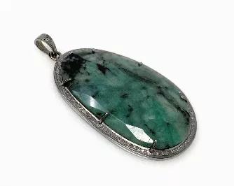 <p>Natural Genuine Rose Cut Emerald Sterling Silver Diamond Pendant.</p> <p>SIZE : 2.5" x 1.35" ( including Bail)<br> GROSS WEIGHT : 19.13g<br> STONE WEIGHT : 8.67g<br> DIAMOND WEIGHT : 0.80Cts<br> EMERALD GRADE : AAA GRADE<br> GEMSTONE : NATURAL ROSE CUT EMERALD<br> ORIGIN : BRAZIL<br> TREATMENT: NO TREATMENT<br> METAL : 925 STERLING SILVER AND RHODIUM POLISH OVER IT<br> SHAPE : FREE FORM</p> <p>HANDMADE<br> **All Measurements are close approximations**</p> <p>SAKOTA EMERALD : EMERALD : Emerald