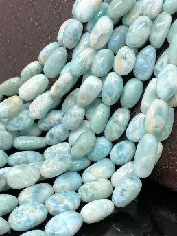 <p>Genuine Natural Dominican Republic Larimar Gemstone Beads Jewelry Supplies for Jewelry Making.</p> <p>SOLD AS : 16" STRAND<br> SIZE : 8mm x 7mm - 17mm x 11mm ( LxW - LxW)<br> BEAD HOLE SIZE: 0.75mm<br> GEMSTONE. : NATURAL UNTREATED LARIMAR<br> ORIGIN. : DOMINICAN REPUBLIC<br> SMOOTH : YES<br> GRADE : AAA GRADE</p> <p>Larimar is the embodiment of the tranquil Sea and Sky energies. Its soft, soothing blues and calming turquoise is streaked with white patterns that resemble sunlight dancing bene