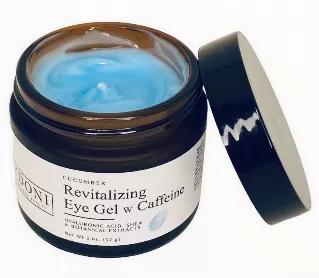 <p>Kiss puffy tired eyes goodbye! This cooling gel formulation will help improve the appearance of the delicate skin around the eyes with a complex of Botanical Extracts, natural sugars, vitamins A, E and K and Caffeine.</p>
<p>Give your eye area the ultimate treatment with Botanical Extracts of Aloe, Shea, Avocado, Cucumber, Coffee, Jojoba, Basil, Turmeric, Ginger and Eggplant which gives this eye gel its natural blue color.</p>
<p><strong>How to Use:</strong> <br>AM/PM Tap a small amount aroun