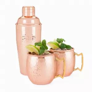 A Hammered Surface And Gleaming Copper Finish Draw Light To This Exquisite Classic Cocktail Shaker And Two Matching Moscow Mule Mugs. The Three-Piece Set Is A Gorgeous Accent In Any Kitchen Or Atop Any Bar Cart.<Ul><Li>Two 16-Oz Mugs & One 25-Oz Shaker</Li><Li>Food-Safe Copper & Stainless Steel</Li><Li>Makes A Great Gift!</Li></Ul> Includes Two 16 Oz Mugs & One 25 Oz Shaker With Lid Food-Safe Copper & Stainless Steel Hammered Surface And Gleaming Copper Finish Draw Light To This Exquisite Classi
