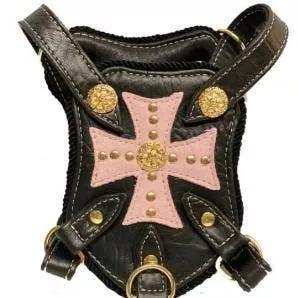 Made with Vegan leather and suede. Signature hardware with snap closures. The straps, breastplate, and backplate have suede padding on the inside of the harness for comfort Adjust straps one and snap close.<br><br>Signature Duke and Dutchess hardware.<br>