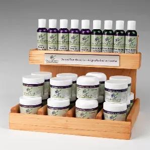 Our Vermont Handcrafted wooden display is the perfect presentation for this collection of our Best Sellers. <br>

This collection includes 5 each of our Herbal Healing Salves, Eczema Salves, Aches Away Plus Salve, and our luscious Daily Herbal Skin Cream. <br>
Plus the upper shelf for our top-selling Rest & Relax Rub and our Aches Away Massage oil. <br>

Display is 12.5" wide - 8.5" deep - 9" tall
