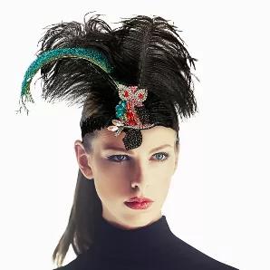 Peacock and Black Feather Gatsby Style Black Sequin Stretch Headband Featuring Multi Color Crystal Rhinestone Owl Detail. Headband measures 1.25 inches wide. Top of Feather to Bottom of Owl measures approx 10 inches