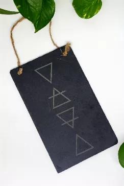 This gorgeous 10" by 6" engraved slate wall hanging features symbology familiar to wiccan + pagan practices representing earth, air, fire + water. We make these unique items here in Maryland!  



