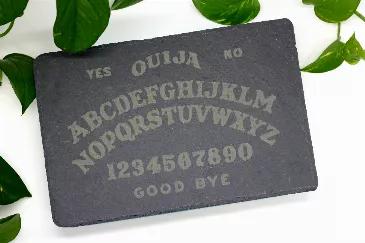 This stunning slate trivet will bring magic to any kitchen. It measures 9" by 12" and features an engraved with a ouija board. Made here in Maryland it's the perfect gift for experienced witches + baby witches alike! 