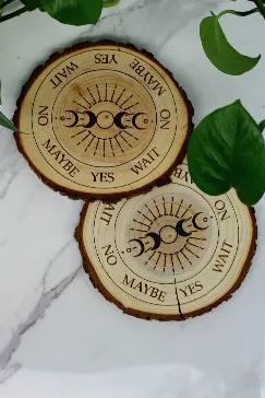 These gorgeous moon phase pendulum boards are made of natural pine wood. We design + laser engrave in house in Maryland, which means these pendulum boards are a unique sku! <br>

Each measures between 6-6.5" in diameter, variations in the wood + cracks may appear as each piece will be unique.<br>


Please note pendulum not included with this item but available in our store!
