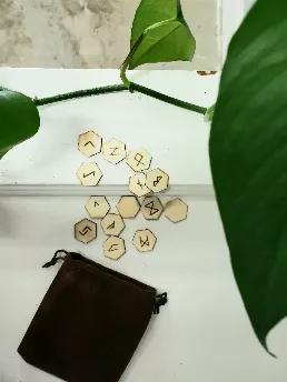 These delicate hexagonal runes are made here in Maryland. A soft wood engraved with the Elder Futhark all in a velvet bag. Bags will vary in color. 
