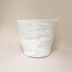 <p> The perfect basket to hold of your laundry. It's large, yet sturdy and includes two sewn-in handles for easy lifting. Made of natural, non-toxic cotton rope. Machine washable for easy care. To reshape, overstuff the basket with loads of laundry or pillows and let stand for 24 hours. </p> <p> Details: </p> <ul> <li> Measures: approx. 21" h x 18" w </li> <li> Two sewn-in handles. </li> </ul>