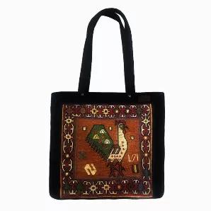 Type: Tote & Shoulder Bag <br>
- Designed in Canada <br>
- Handmade in Turkey <br>
- Water Resistant <br>
Materials: <br>
- Handwoven Wool Kilim <br>
- Suede Cloth <br>
- Suede Cloth Strap <br>
Cleaning & Care: <br>
Cleaning of kilim products is similar to cleaning a Turkish rug: Use either a clean piece of sponge or cloth along with carpet shampoo. <br> *Additional photos are for shape and size reference. The bag for sale is the first two photos listed.
