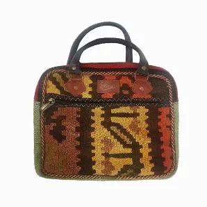 Type: Handbag & Shoulder Bag <br>
- Designed in Canada <br>
- Handmade in Turkey <br>
- Water Resistant <br>
Materials: <br>
- Handwoven Wool Kilim <br>
- Suede Cloth <br>
- Leather Strap <br>
Cleaning & Care: <br>
Cleaning of kilim products is similar to cleaning a Turkish rug: Use either a clean piece of sponge or cloth along with carpet shampoo. <br> *Additional photos are for shape and size reference. The bag for sale is the first four photos listed.