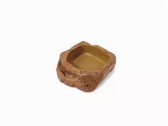 <p>This product is designed to either be used as a water bowl or a food dish!<br></p>
<ul>
<li>Deep enough to be used as a small water bowl</li>
<li>Can be used as a food dish, ideally for jarred foods and pellets</li>
<li>Made of resin</li>
<li>Easy to clean</li>
</ul>

Dimensions: 2 in. x 1.5 in. x 1 in.