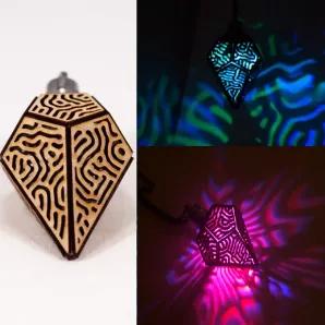 This is 3d printed, laser cut, and hand assembled art. You can wear it, hang it off your Christmas tree, or just put it in a place that could use a lil extra glow. LED turns on with the twist of the top and batteries keep LED bright for around 6 hours, then LED dims, but will stay Lit for around 8-16 hours total. Each pendant comes with an extra set of LR41 batteries to ensure you don’t stop shining anytime soon :) a chain is also included so that you can wear your Aglow Geo right away.
