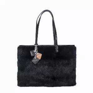 Hello fur! Made in luxurious rabbit fur and genuine leather, this shoulder bag will a show stopper everywhere you go. Accented with the signature ClaudiaG Diamond drops, purple lining and inside zipper pocket.
