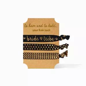 A perfect addition to your bridesmaid proposals, bachelorette party favor kits, or for the day of the wedding, each hair tie set is on a piece of cardboard and includes three hair ties.