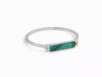 This small ID cuff bracelet from the LMJ Origin Collection pays homage to Mother Earth's beauty and is a modest boost to effortless style. Crafted in 925 Sterling Silver, this tasteful small ID cuff bracelet features a Malachite stone with a sleek precious metal design. This small ID cuff bracelet is beautifully presented with the inspirational poem, "Origin", written by the LMJ Founder <br>*Note: This piece is handmade on a made-to-order basis. Please allow 2 weeks for delivery. Malachite is a 