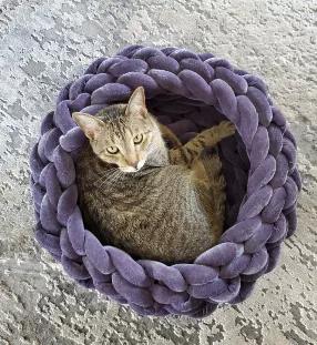 This luxurious and velvety pet bed will cuddle your furbaby in comfort.  Made of soft poly velvet with fiber fill, it is knotted into a braided weave design for a unique texture that compliments modern or casual décor.<br>
Perfect for cats and small dog breads.  Measuring 22"x22"x6.5" and fits most pets weighing up to 20 lbs.  Spot cleaning is recommended.  If you need to machine wash we recommend placing in a washing net on gentle cycle to hold the construction and shape.<br>
Flat air dry is b