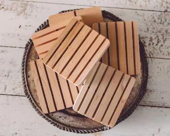 Even though our organic handmade soap will last a very long time in the shower without the use of a soap dish, many prefer to use one so that water can amply drain away from the soap. Untreated Cedar is perfect for this use as it does not rot, does not absorb water and is naturally resistant to mold and mildew! Our cedar soap dishes are an eco-friendly way of keeping your soap dry and tub or shower surround clean.<br>
Each soap deck measures 3.50 x 3 inches. Because these are handmade, color and