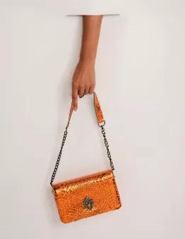 Durable High Quality Lamb Leather<br>
Adjustable length (26" max crossbody drop)<br>
Stud closure<br>
Slip pocket<br>
Artisan crafted jewelry<br>
Please note: As it is made of a natural material, each bag varies slightly in texture and color<br>